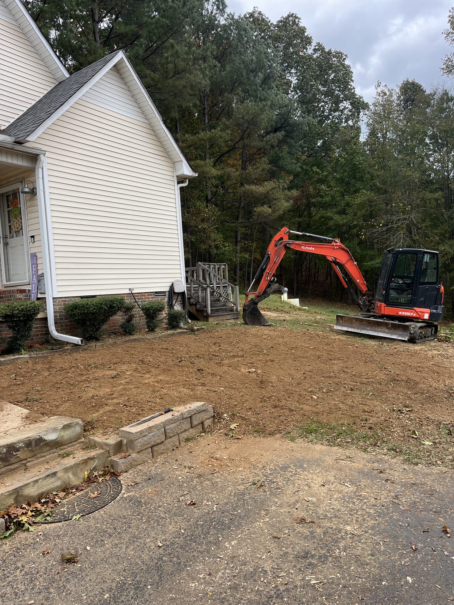 Final dirt grade around a home in Selmer TN